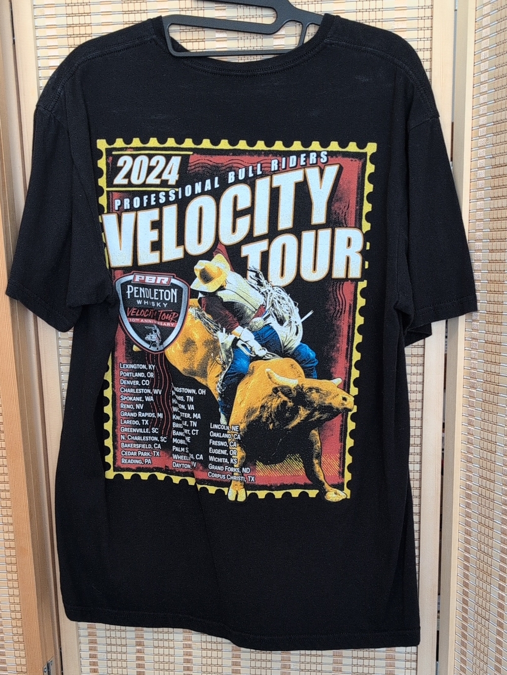 PBR Black Tee with Yellow, Red and Blue Bull Riding Graphic